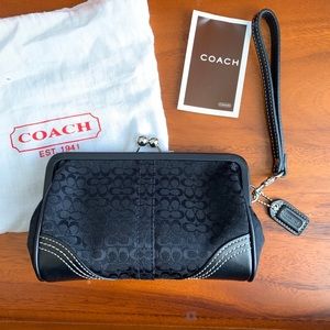 Coach wristlet with kiss lock